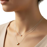 Collar con Corazón Dorado y Esfera
