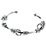 Brazalete Torcido Con Argollas De Plata